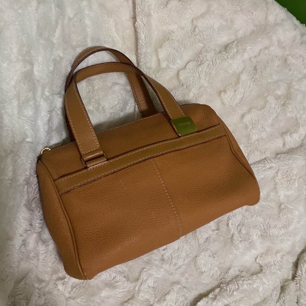 Burberry’s leather brown tan bag -good used condition -firm